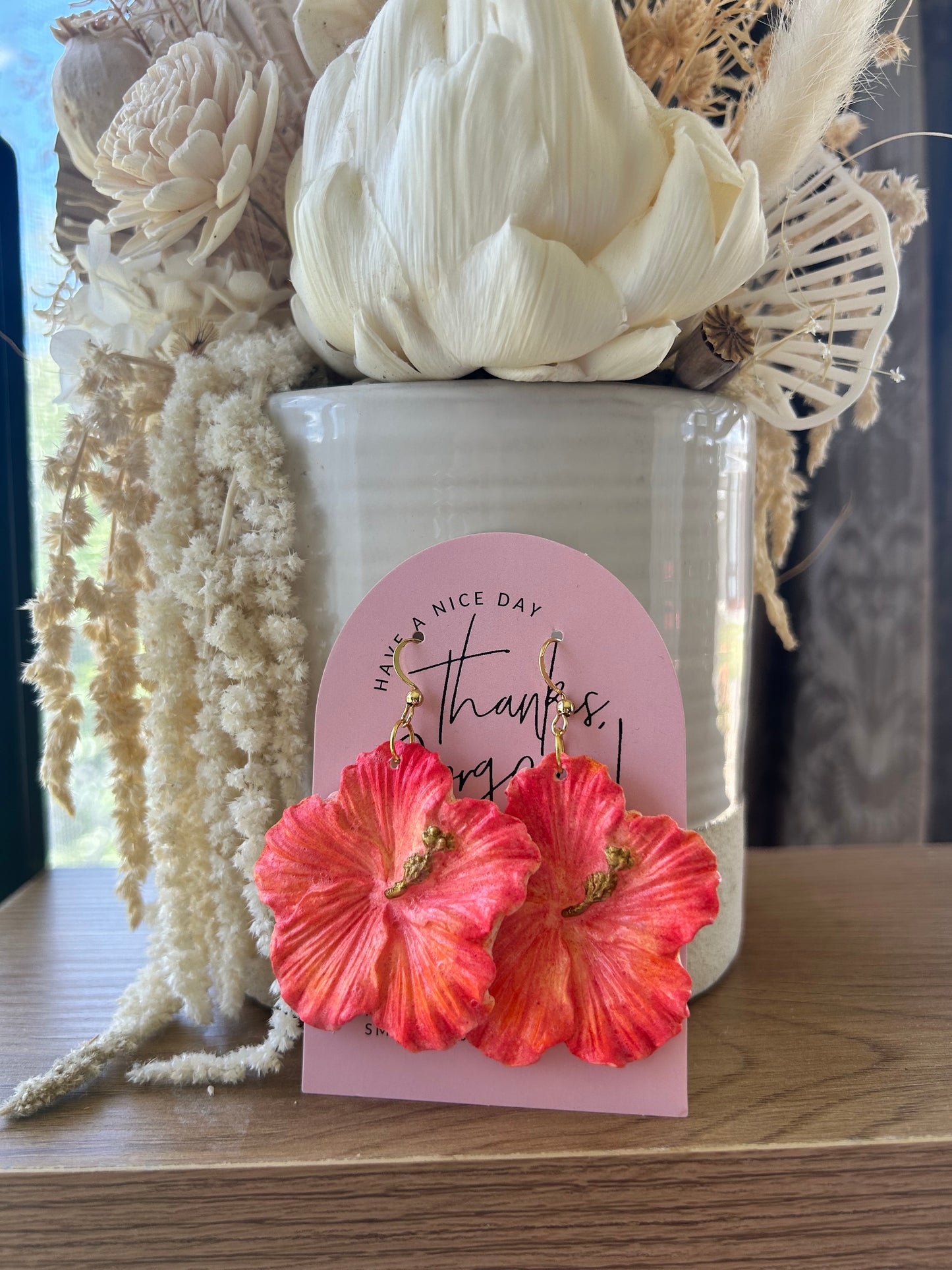 Clay hibiscus earrings (pink sunset tones)