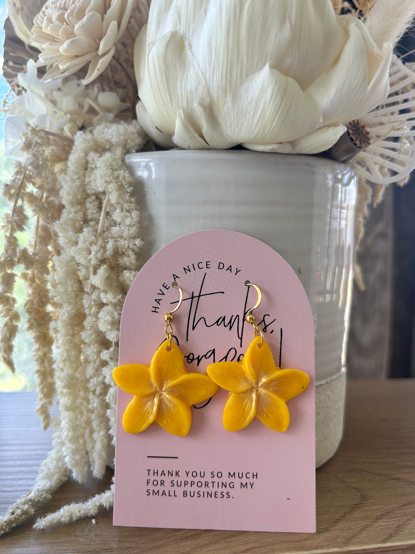 Clay frangipani earrings (yellow and gold tones)