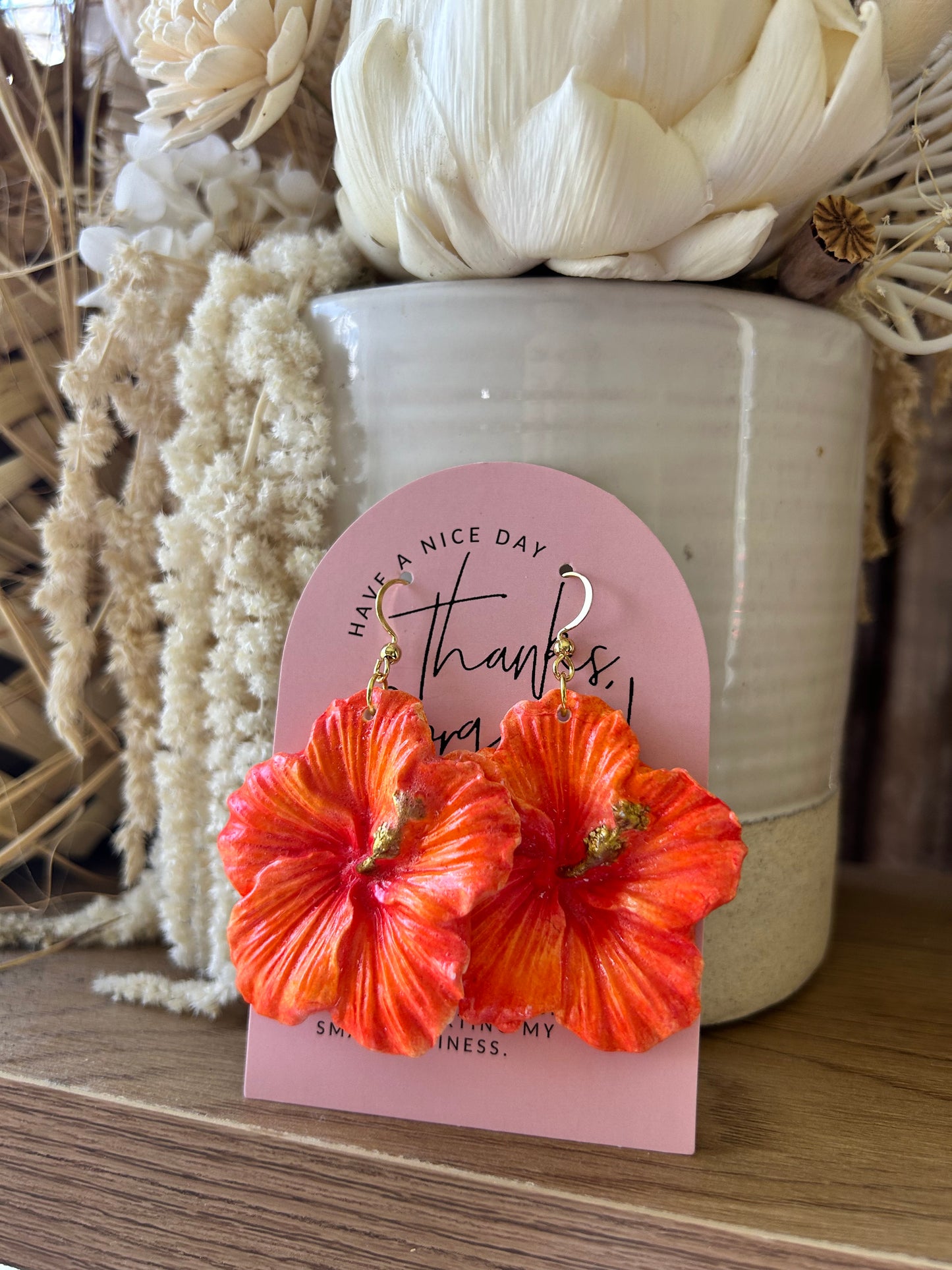 Clay hibiscus earrings (deep orange)