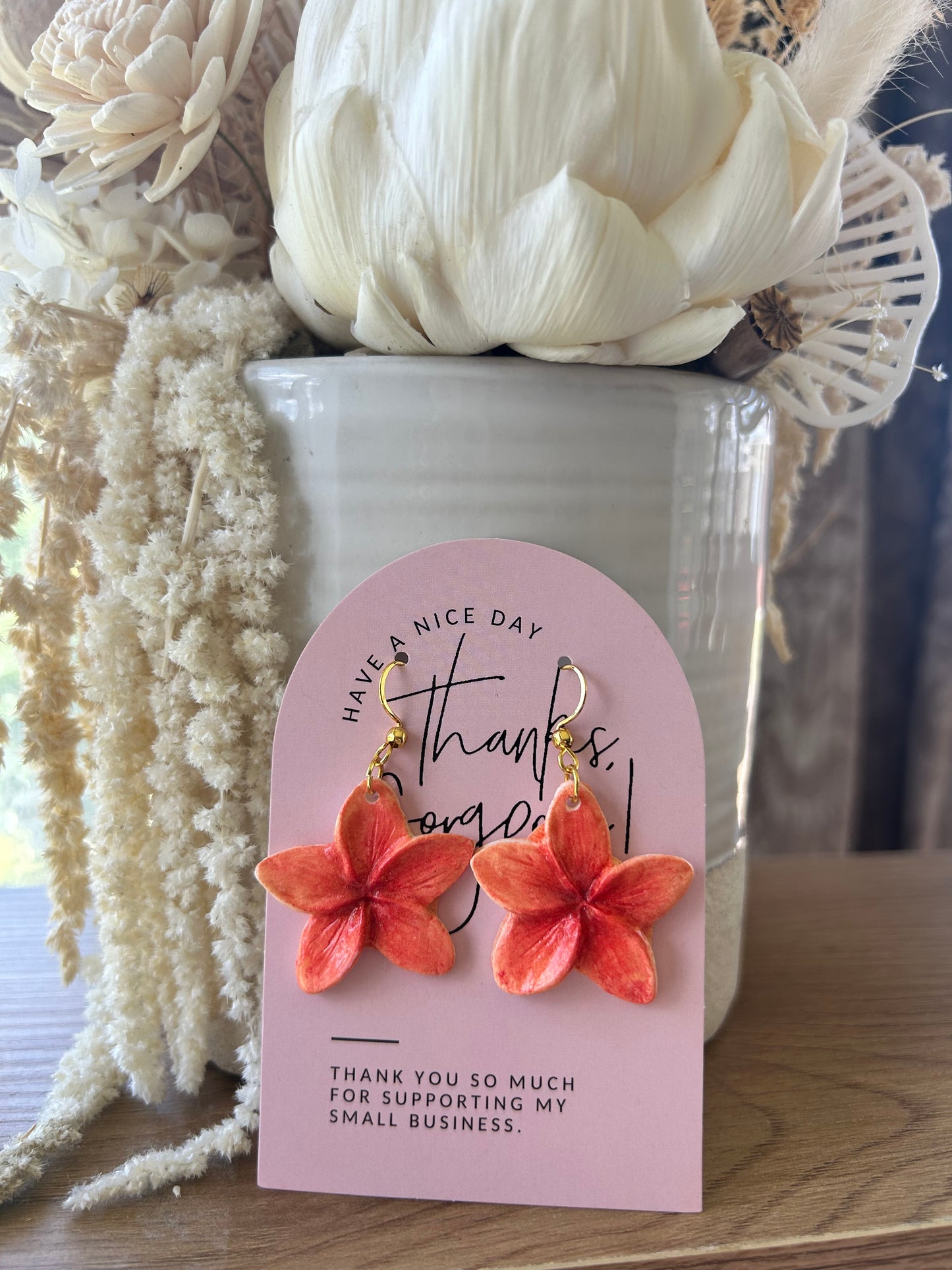 Clay frangipani earrings (peach tones)
