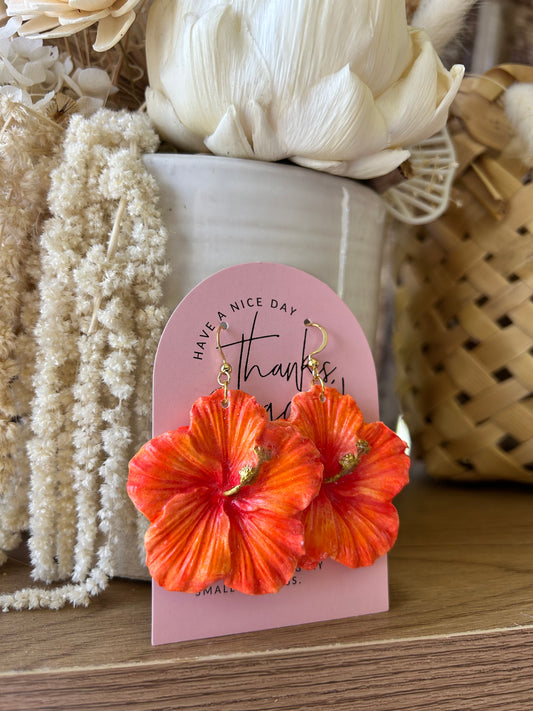 Clay hibiscus earrings (deep orange)